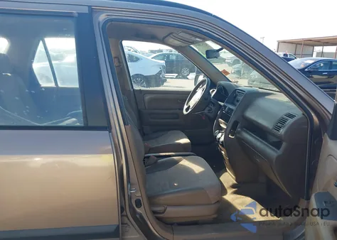 2004 Honda Cr-V Lx z USA, uszkodzony, nr VIN JHLRD68574C006688